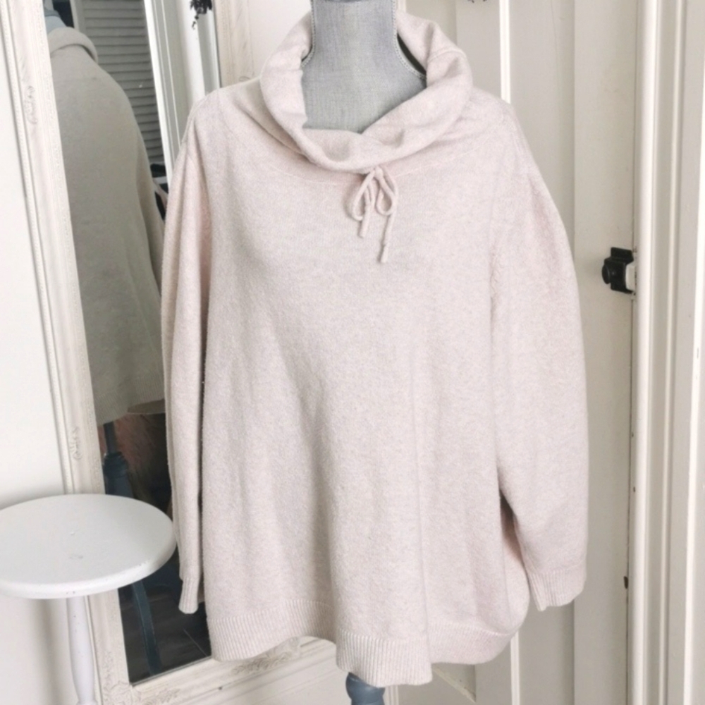 In every story.... cream athletic cowl neck sweater. Size 5XL